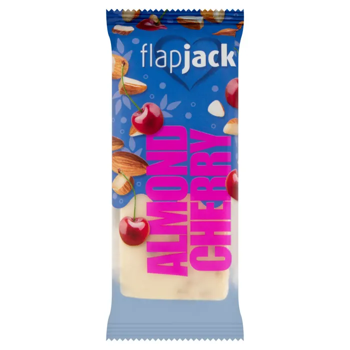 FlapJack meggyízű mandulás zabszelet kandírozott cseresznyedarabokkal, fehér bevonóba mártva